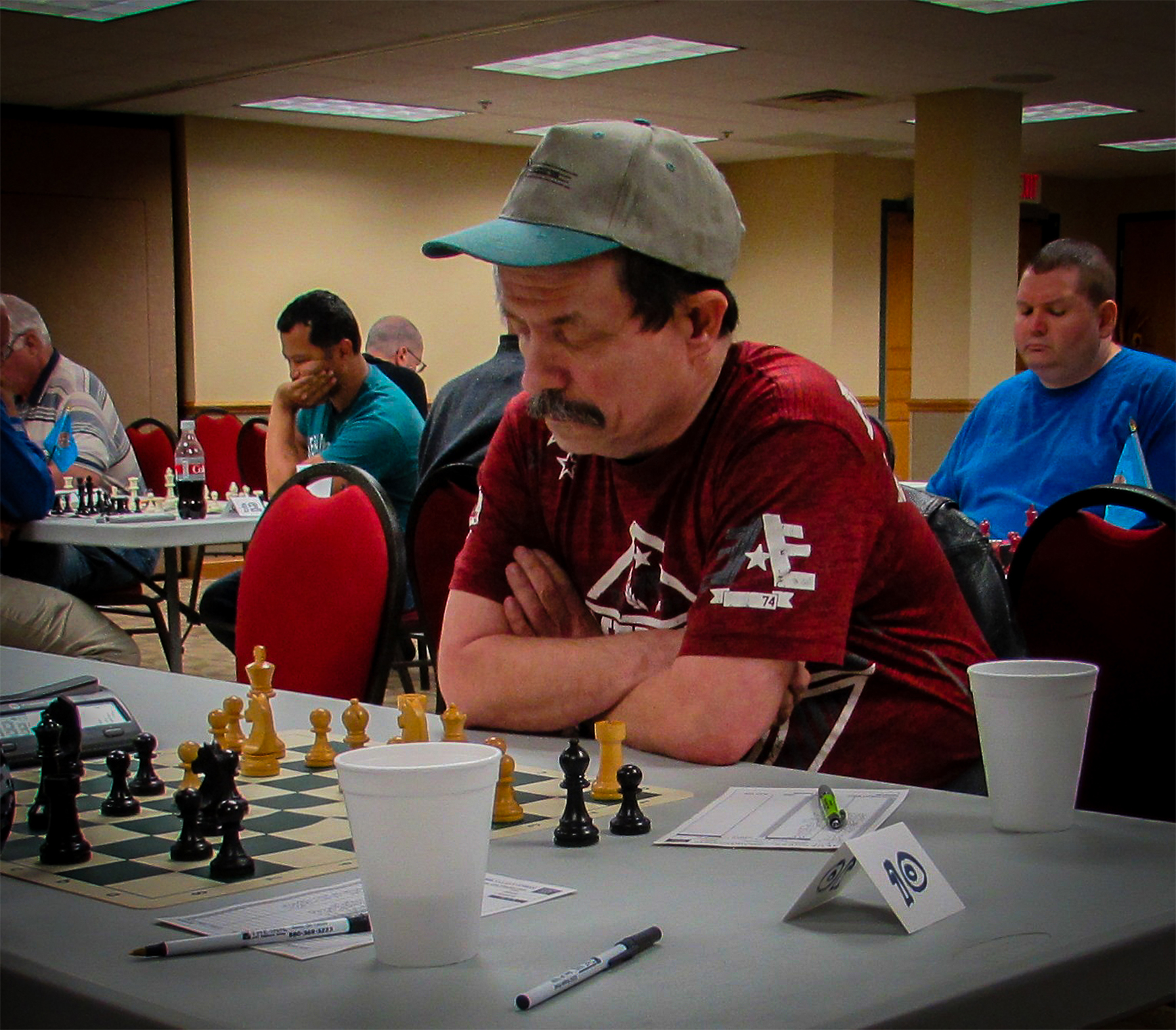 In his sevententh RRSO, Bruce Wells played a close match against a determined Texan.  He won the Oklahoma City Championship in 1977.  He is ranked in the 82nd Percentile for all USA chess players and ranked Number 70 in Oklahoma.  Photo by Mike Tubbs.